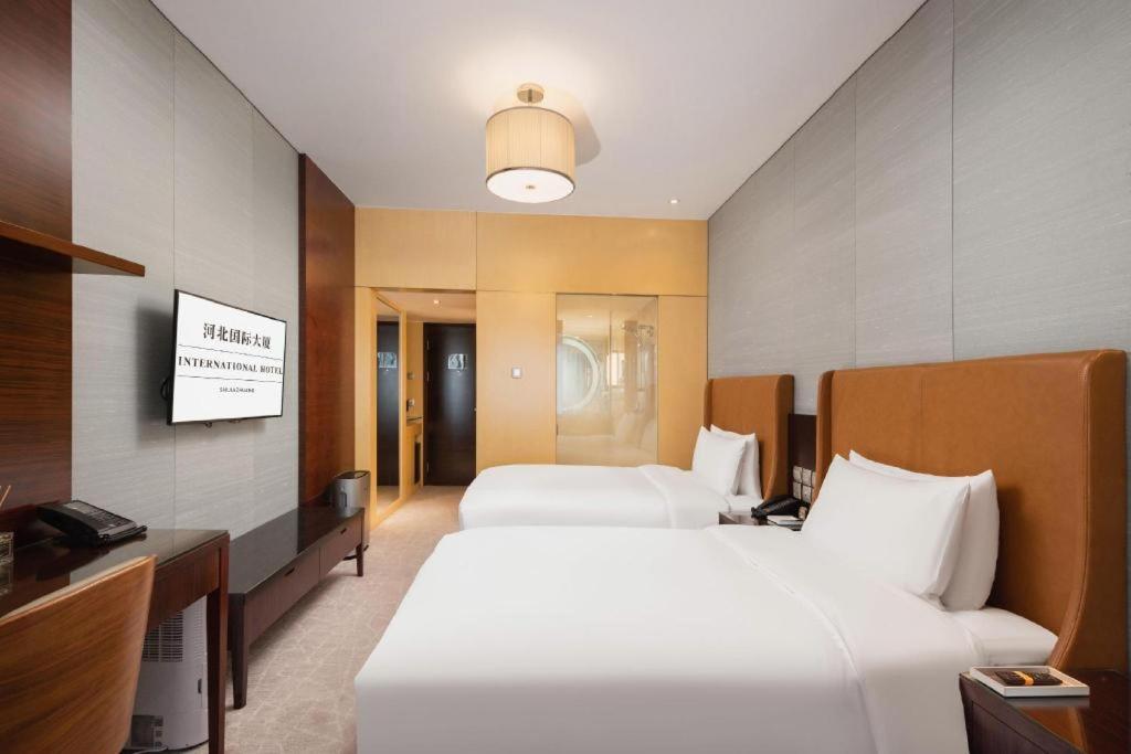 Shijiazhuang International Building Hotel Bagian luar foto
