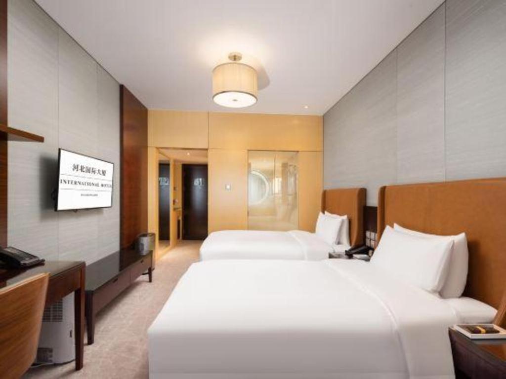 Shijiazhuang International Building Hotel Bagian luar foto
