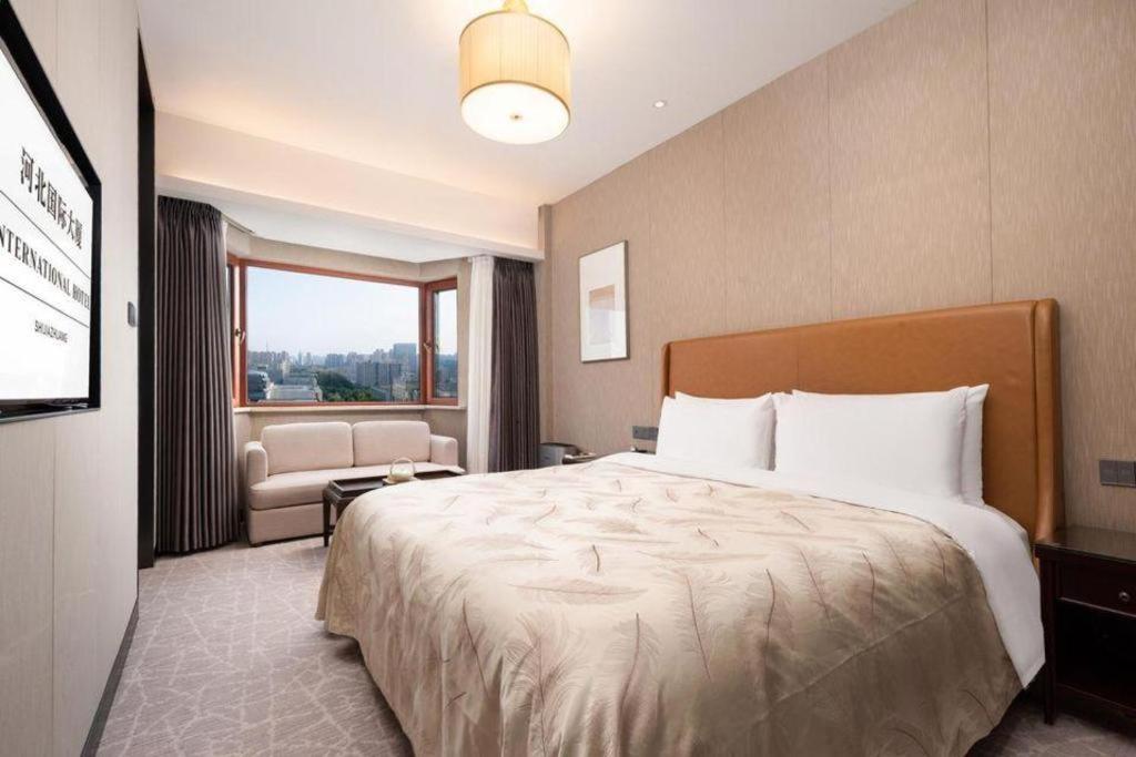Shijiazhuang International Building Hotel Bagian luar foto