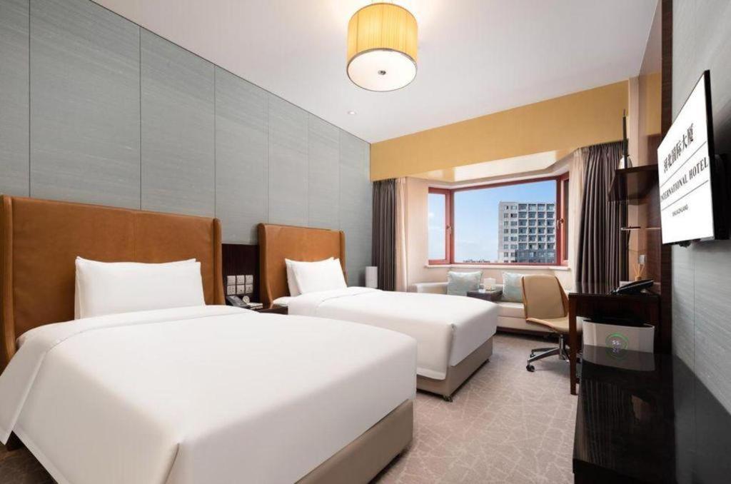 Shijiazhuang International Building Hotel Bagian luar foto